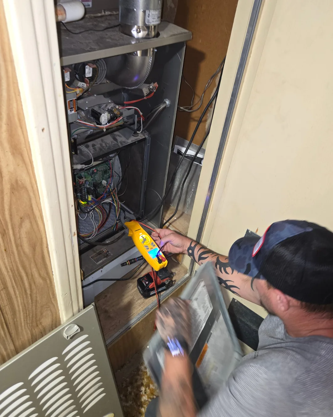 Two Hawkins technicians working on refrigeration equipment